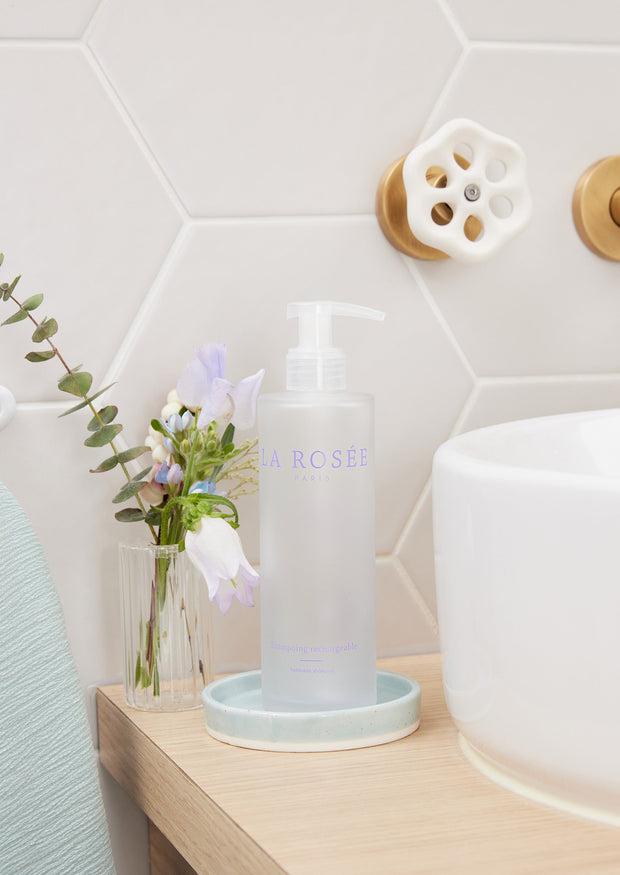 Flacon de shampoing en verre